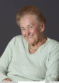 The photograph is of Mrs Rita Jillard and her three children at the Shrine  of Remembrance in Melbourne one Anzac Day in the early 1950s. From the  left... John, Lois, Mrs Jillard
