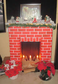 Christmas without a fireplace just doesn't feel complete. Christmas Decorations Diy Fake Cardboard Fireplace Modern Day Gramma