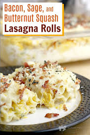 Delicious Rolls Of Tender Pasta Filled With A Luxurious Squash Filling Baked In Bechame Butternut Squash Lasagna Butternut Squash Lasagna Rolls Lasagna Rolls