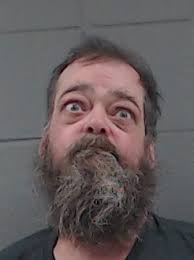 Woodstock man charged with illegally possessing firearms after police, SWAT  team surround home for 5 hours