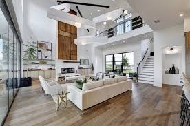 Ceilings are an essential part of a home's interior effect, aside from being integral support to the interior walls, furniture, and flooring. Open Concept Modern Living Room Tall Ceiling Living Room High Ceiling Living Room Modern Open Living Room Design