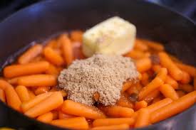 Tip the carrots into a roasting tin and toss with the sunflower oil and some salt and pepper. Brown Sugar Glazed Carrots Recipe Video Lil Luna