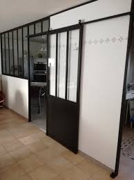 Ces portes atelier d'artiste pliables en accordéon se manoeuvrent sur un rail installé dans la partie supérieure du bâti ou sur un linteau. Blog De La Maison De L Imaginarium L Ambiance Factory 100 Sur Mesure Verriere Impostes Et Porte Coulissante Style Atelier