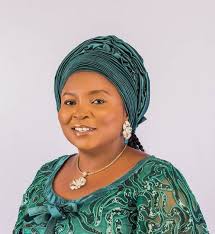 AMANA CAMPAIGN ORGANIZATION CELEBRATE WITH THEIR PRINCIPAL HON. ELIZABETH  SAMSON YERSE ON THE OCCASION OF HER AUSPICIOUS BIRTHDAY A drumbeat echoes  through the air, It sings of kindness, love, and care, A