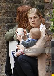 Submitted 1 year ago by deleted. Actress Rosamund Pike Is Pictured Being Given A New Golden Bike Bike Rosamund Pike Actresses Rosemund Pike