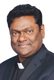 PRIESTS ASSUME NEW ASSIGNMENTS IN JULY