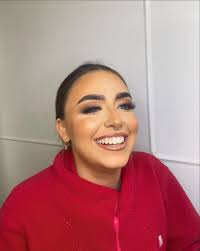 Cara McLaughlin Makeup added a...