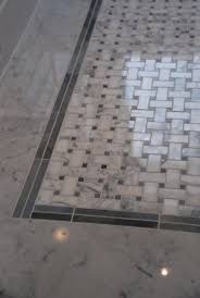 30 Creative Tile Rug Inlay Ideas For Your Bathroom The Urban Interior Creative Tile Bathroom Floor Tile Patterns Bathroom Floor Tiles
