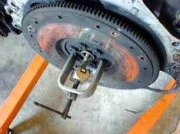 You can use a sand filled large plastic hammer on the back end of the input gear or a short handled steel sledge on the steel rod's end. 302 Engine Dress The Future Garage
