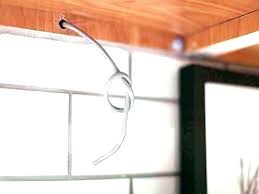 Under cabinet lighting can be make or break between properly lighting up your kitchen or having dark areas where you need to work. How To Hide Under Cabinet Lighting Wires Lighting Tutor
