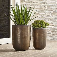 The first recorded use of the term is from an 1861 issue of the american agriculturist. Metallic Bronze Large Planter Crate And Barrel Outdoor Planters Planters Large Planters