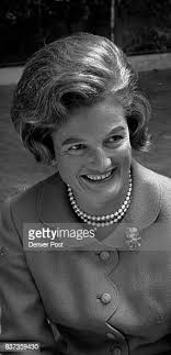 Mrs. Kennard Perry Ware a bright green suit. Credit: Denver Post News Photo 