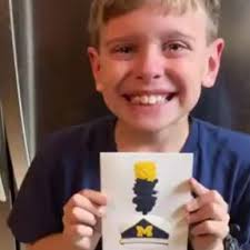 Henry Boyer receives letter from Michigan band