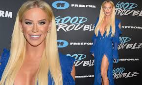 We've got more cool interviews for you! Gigi Gorgeous Is A Busty Blonde Bombshell In Blue At Premiere Of New Freeform Show Good Trouble Daily Mail Online