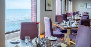 It overlooks the world's longest porch and the hotel's many american flags, as well as the glistening straits of mackinac. Restaurants Bars Grand Hotel Blackpool