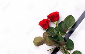 Usually, the cemetery staff disposes of these items within a week of the funeral. The Concept Of Death And Mourning Fresh Rose Flowers With Black Mourning Ribbon On A White Background Stock Photo Picture And Royalty Free Image Image 150474758