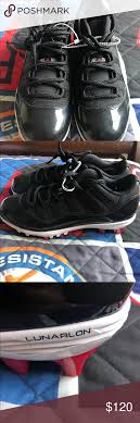 Nike Air Jordan 11 Retro Low Bred Black Red Cleats Nike Air Jordan 11 Retro Low Bred Men S Size 10 5 Black Red Ao1 Nike Air Jordan 11 Air Jordans Air Jordan 11