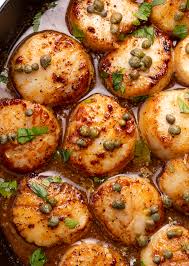 Cook scallops until golden brown on the bottom, about 2 minutes, then flip using tongs. Pan Seared Scallops With Lemon Caper Sauce Baker By Nature