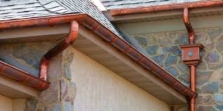 The bronze gutter color looks elegant and blends naturally with. Gutter Installation New Jersey Roofing Siding Company Blue Nail