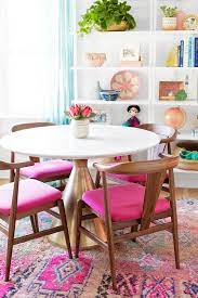 The use of carved chairs paired with a wonderful dining table. 30 Round Dining Tables For Every Budget Eclectic Dining Room Dining Room Furniture Design Dining Room Small