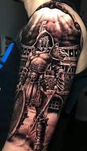 Armor tattoos ideas & designs. 40 Awesome Gladiator Tattoos To Get Inspired Photos And Tattoos Photos Gladiators To Inspire Gladiator Tattoo Warrior Tattoo Sleeve Shoulder Armor Tattoo