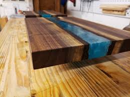 Use a baltic day epoxy resin pigments and resin with a 1:1 mix ratio. Blue Resin River Cheese Cutting Board The Knotty Log