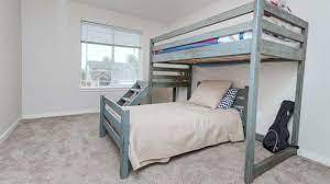 Our kids' bunk bed not only gave our kids a safe place to sleep and relax, but also served as storage for their books. Bunk Bed Ana White