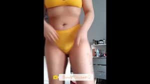 Bunny Blacked showing off her body and QOS tattoo