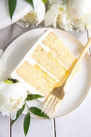 Slice Of Lemon Elderflower Cake Copycat Royal Wedding Cake Elderflower Infused Lemon Cake Layers With Lemo Savoury Cake Royal Wedding Cake Wedding Cake Slice