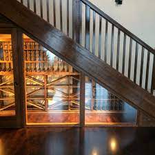Wine storage under the stairs in the west village, new york city, via billinkoff architecture. A Small Area Under The Stairs Was Brought To Life By A Wine Cellar Master Builder In Vancouver Bc Blue Grouse Wine Cellar