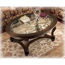Check spelling or type a new query. T499 0 Ashley Furniture Oval Cocktail Table