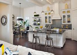 The kitchen cabinets are painted red, and the hallway wall is painted blue. Spice Up Your Kitchen Design With A Mexican Style Decor Eclectic Kitchen Design Coastal Kitchen Decor Eclectic Kitchen