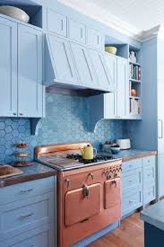 Inspired by vibrant skies and the ocean, this stunning kitchen features ocean blue kitchen cabinets with hints of yellow and beige. 40 Blue Kitchen Cabinet Ideas Blue Kitchen Cabinets Hello Lidy