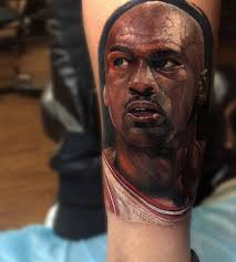 It's an omega horseshoe, and it was drawn on as a way of pledging his commitment to the black fraternity omega psi phi, which he was a part of while he attended the university of north carolina. Michael Jordan S Realistic Portrait Tattoo On The Leg