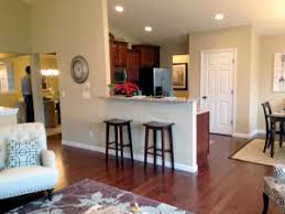 It's common in truly open homes for spaces to share design elements like similar color schemes, patterns and textures. Selecting Home Color Scheme Finishes Building Dreams