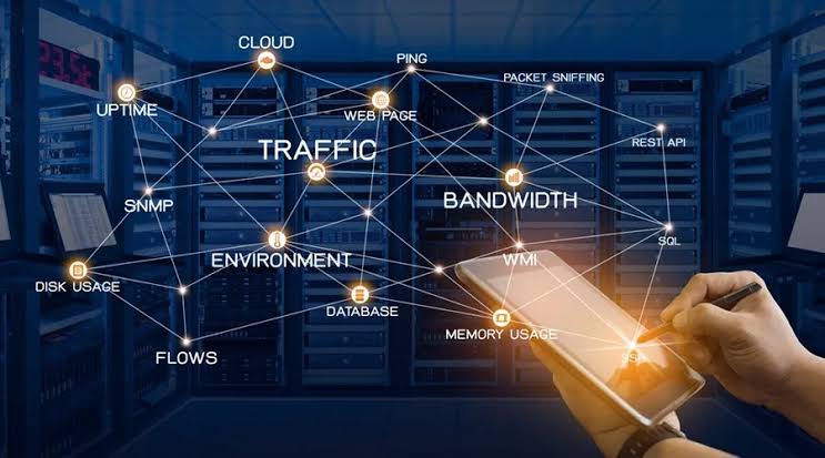 Network operation center monitoring screens displaying data analytics