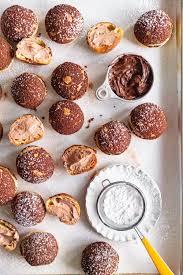 Chocolate Hazelnut Cream Puffs With Whipped Cream Cloudy Kitchen Recipe In 2020 Chocolate Cream Puff Chocolate Hazelnut Cream Puff Recipe