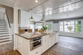 12 inspiring kitchen island with sink ideas — and everything you need to know about them. Kitchen Island With Apron Sink And Microwave Cottage Kitchen