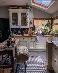 Cabinet and dining table and red wall in wood make this kitchen look warm and inviting. Cozy Kitchen Cozyplaces Home Kitchens House Interior Home