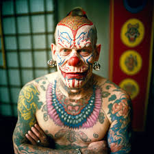 imagine [ prompt ] Fantastic intricate tattooed creatures from an alternate  era that I could not imagine or create