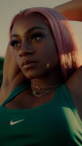 Big League Jo hits the track with Sha’Carri for @whoop