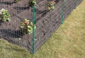 Erecting A Wire Fence At The Home Depot Wire Fence Chicken Wire Fence Garden Fence