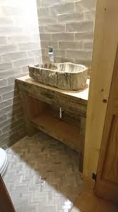 petrified wood sink rustic bathroom