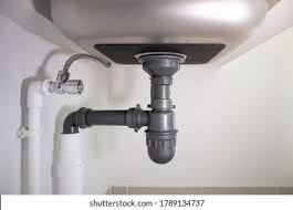under sink plumbing high res stock