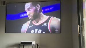 Xiaomi Mi Ultra Short 5000 Ansi Lumens Laser Projector Nba Finals Raptors Vs Gsw On 100 Inch Screen With Xiaomi Projector In 2020 Cheap Bedroom Decor Quirky Home Decor Beautiful Houses Interior