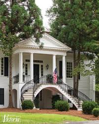 An old journal from the 1800s described what the interiors had looked like at the time, and they recreated as much of the white and wood palette as possible. A Lovingly Restored Antebellum Home The Glam Pad
