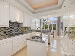 Maybe you would like to learn more about one of these? Grey Gray And White Condo Kitchen L Ermitage Grey Oaks Naples Fl Condo Kitchen Kitchen Remodel Kitchen Design