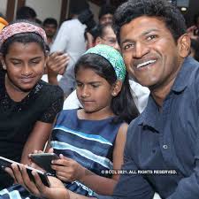 Other roles are played by atul kulkarni and ravi kale ilaiyaraaja is scoring the music for the lyrics by h.s mohanlal wished the team with a recorded video message shown at the function.puneeth rajkumar's daughters drithi and vanditha on friday. Puneeth Rajkumar With His Daughters Driti And Vandita During The Audio Launch Of Movie Mythri In Bengaluru Photogallery