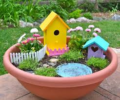 9 Enchanting Fairy Gardens To Build With Your Kids Kids Fairy Garden Fairy Garden Containers Fairy Garden Diy