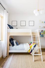 Use wallpaper for an accent wall 6 Ideas For Styling A Big Kid Bedroom Thetot